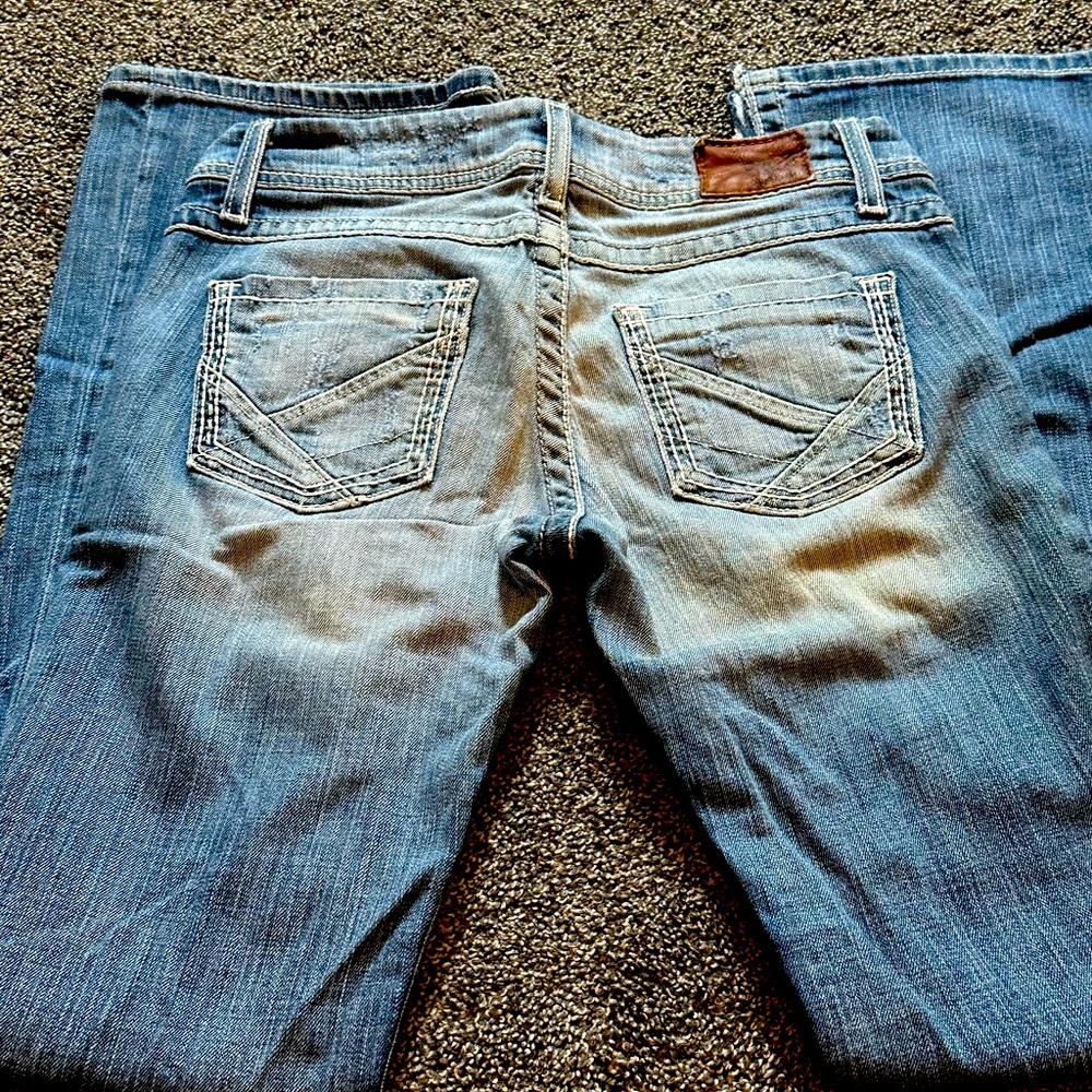 Women’s buckle jeans